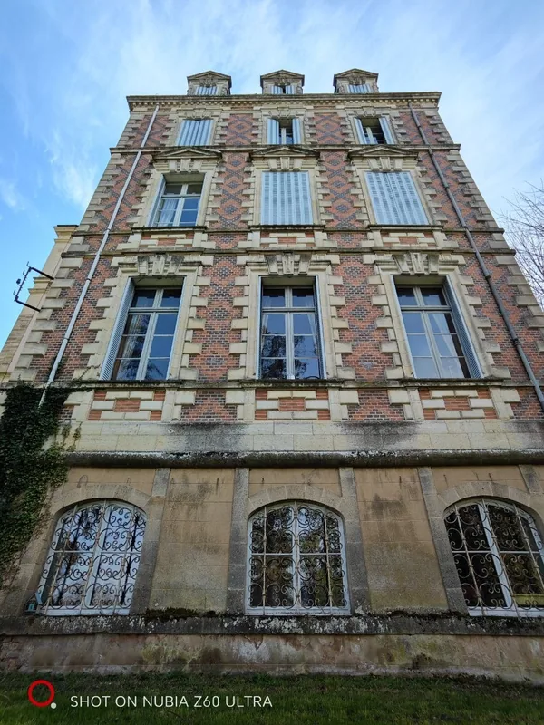 Diamond brickwork across the pavilion elevation