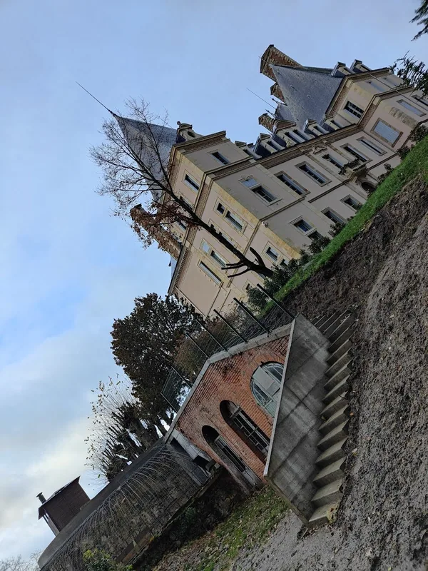 The terrace wall and arched undercroft below the chateau