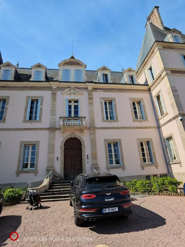 The entrance and forecourt on a clear day