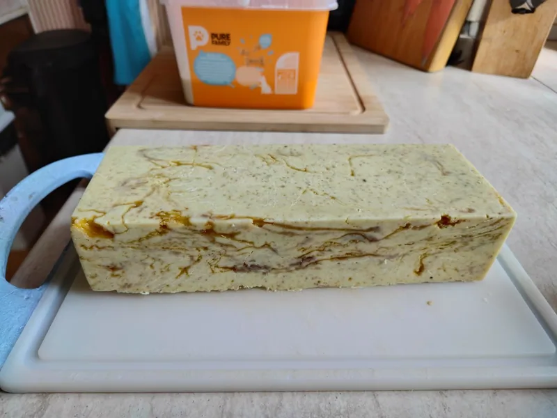 A block of handmade soap made from the estate goat milk