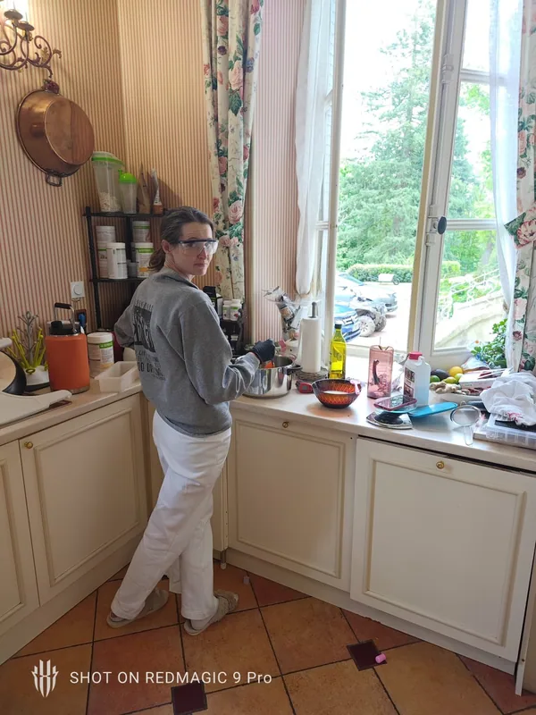 Cooking by the window in the chateau kitchen